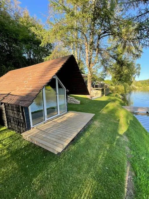 Image 6 of Hyggelig sommerhus. med udsigt, til vand fra senge