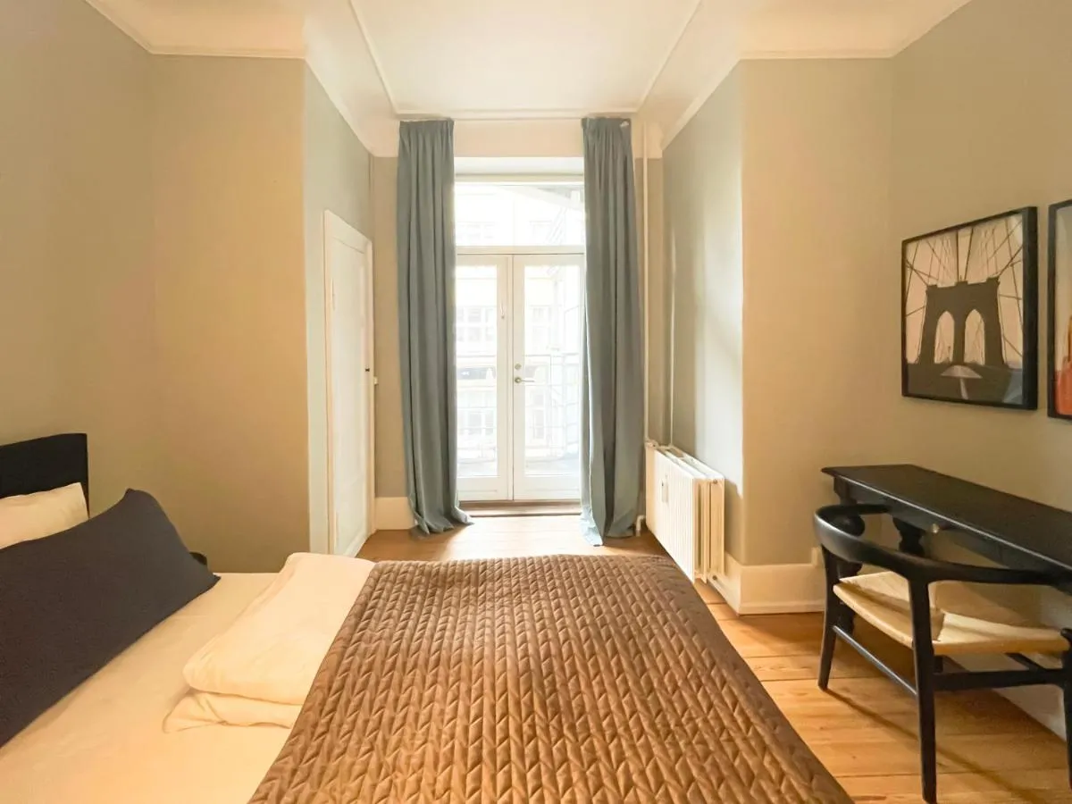 Image 2 of NEW charming apt in City Center