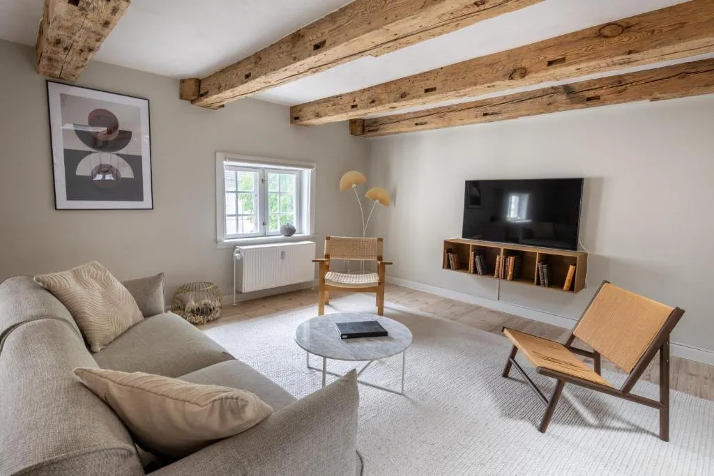 Image of City Apartment With Exposed Ceiling Beams