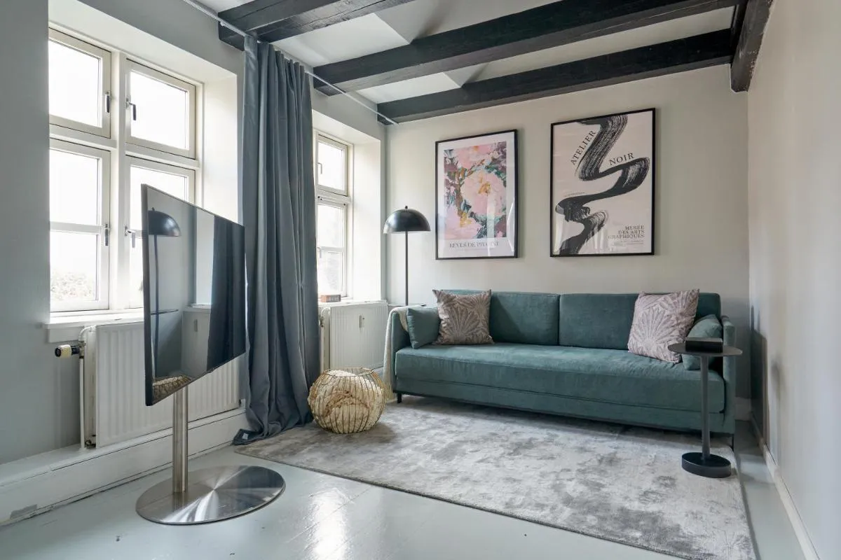 Image 4 of Unique 2 Bedroom Duplex w Exposed Beams in CPH City